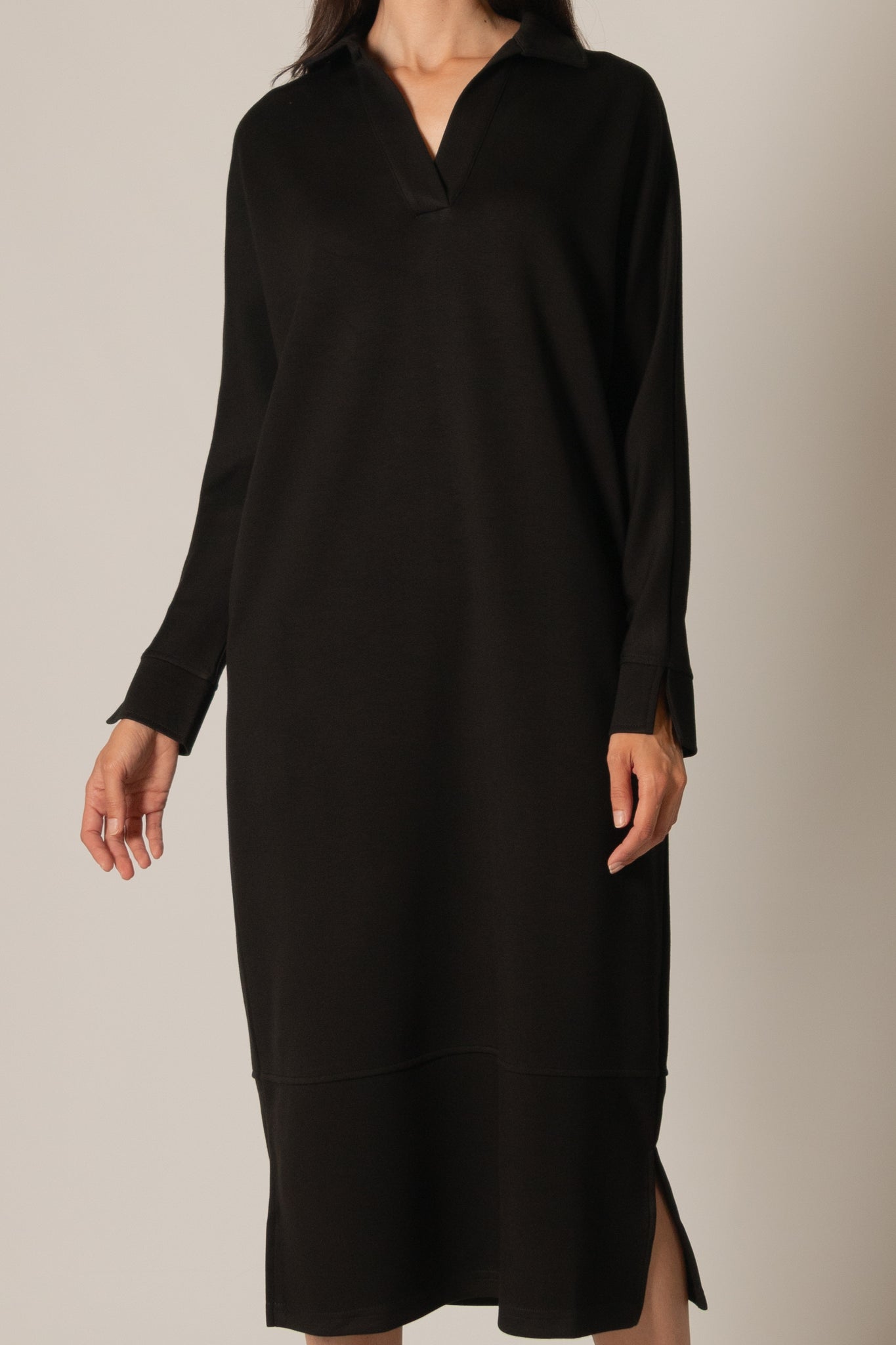 Details: - Butter modal fabrication - Long sleeves - Midi length - Side slits - Collared P.CILL Details: - Butter modal fabrication - Long sleeves - Midi length - Side slits - Collared P.CILL